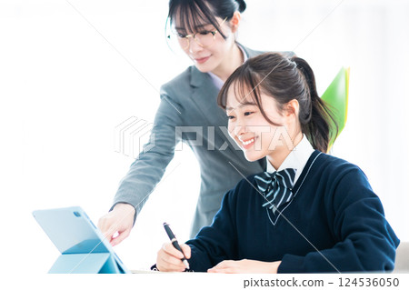 High school girls taking lessons and their tutors 124536050