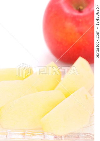 Red apple Koi Fuji Iwate Prefecture cut dessert light background Red apple Koi Fuji Iwate Prefecture cut dessert light background 124536257