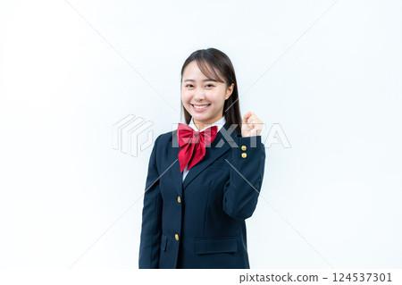 A student doing a guts pose A student doing a guts pose 124537301