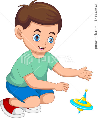 little boy playing with spinning top toy little boy playing with spinning top toy 124538658