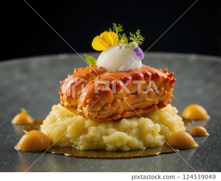 Gourmet seafood cuisine - elegant crab with creamy risotto and floral garnishes for fine dining 124539049