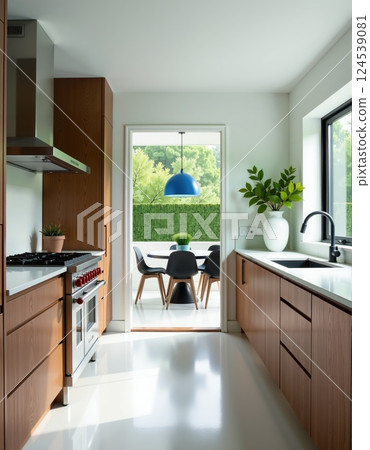 Modern kitchen and dining area with natural light and contemporary design 124539081