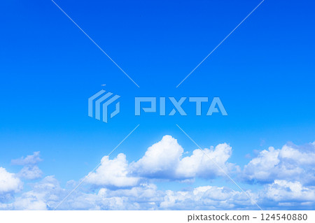 A refreshing blue sky, airplane and clouds 124540880