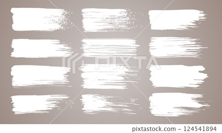 Vector paint brush set. White ink grunge brush strokes. Grunge design elements. Painted ink stripes. Creative isolated spots. Ink smudge, abstract shape stains and smear set 124541894