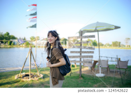 Asian woman with camping activity Asian woman with camping activity 124542622