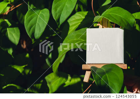 White paper empty copy space for advertisement on farm harvesting background of eco-friendly sustainable growth green leaves lemongrass. Place for text template mock up farm core healthy agricultural 124543055