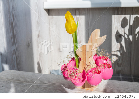 Tutorial How to make Easter table decoration with egg shells step by step instruction. Easter home decoration on wooden branch. Seasonal sustainable recycled 124543073
