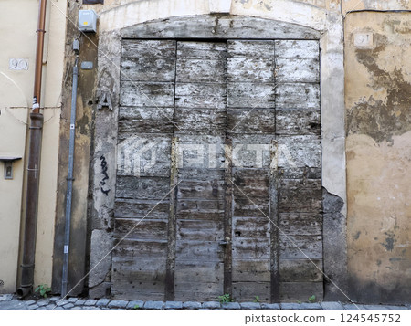 old wooden door in rome histori center near pantheon fountain piazza della rotonda rome detail 124545752