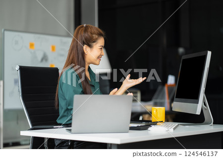 Asian businesswoman teleconference, idea presentation, planning analysis and financial statistics and investment market at office. 124546137