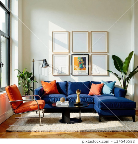 Modern living room with blue sofa and orange accents, plants, and artwork 124546588