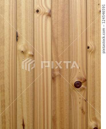 Natural wooden planks with prominent knots and grain patterns 124546591
