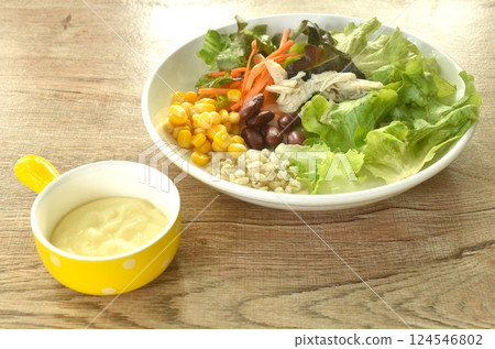 cereal and vegetable dressing boiled chicken breast salad with on plate with cream sauce 124546802