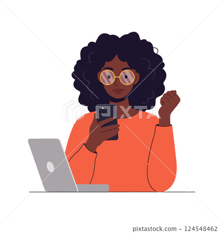Young woman with curly hair using smartphone while sitting at a laptop in flat vector art 124548462