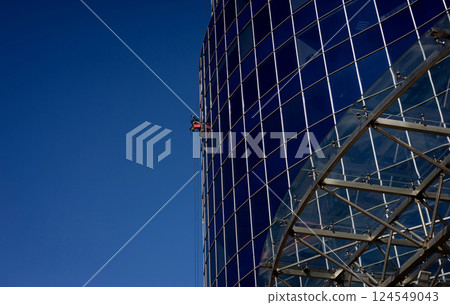 worker cleaning windows 124549043