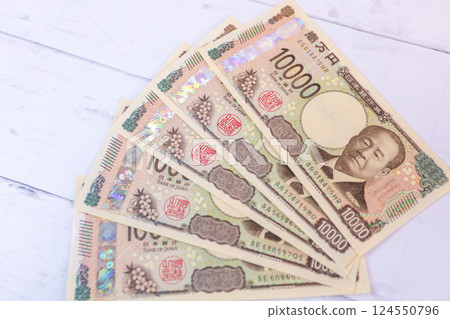 New 10,000 yen bills unfolded New 10,000 yen bills unfolded 124550796