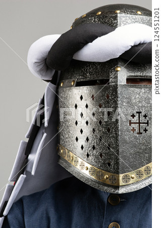 Medieval Knight Helmet with White and Black Drapery 124551201