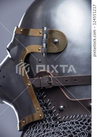 Side View of a Medieval Knight's Helmet with Details 124551217