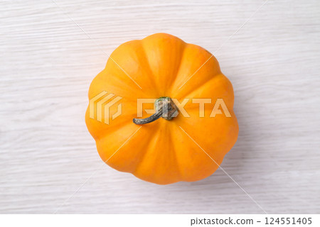 Orange Jack be little pumpkin on white background, Top view 124551405