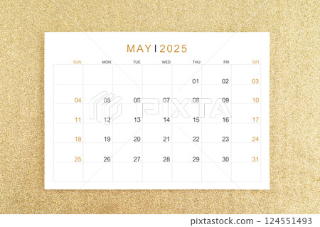 May 2025 page on gold glitter background. 124551493