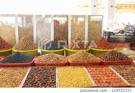 dried fruit and nut in the market Siyob bazaar or so called Slab bazaar is the biggest bazaar in Samarkand. dried fruit and nut in the market Siyob bazaar or so called Slab bazaar is the biggest bazaar in Samarkand. 124552551