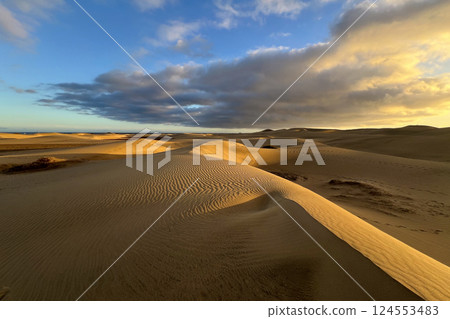 A colorful sunset at a Maspalomas dune, Gran Canaria island 124553483