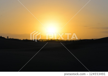 A colorful sunset at a Maspalomas dune, Gran Canaria island A colorful sunset at a Maspalomas dune, Gran Canaria island 124553491