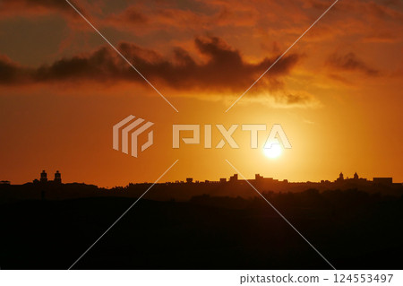 A colorful sunset at a Maspalomas dune, Gran Canaria island A colorful sunset at a Maspalomas dune, Gran Canaria island 124553497