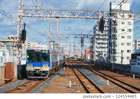 Nankai Main Line train on railway from Wakayama to Osaka 124554465