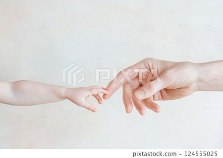 Close-up of a child's hand reaching out to touch an adult's hand. A symbolic image showing the connection between child and adult through the gentle touch of hands. Close-up of a child's hand reaching out to touch an adult's hand. A symbolic image showing the connection between child and adult through the gentle touch of hands. 124555025