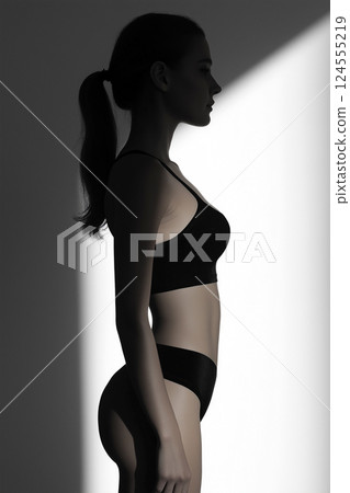 Elegant portrait showcasing refined fitness and stylish modern fashion among concepts. Perfect fit body, fitness and contemporary fashion essence. Sport and diet concept 124555219