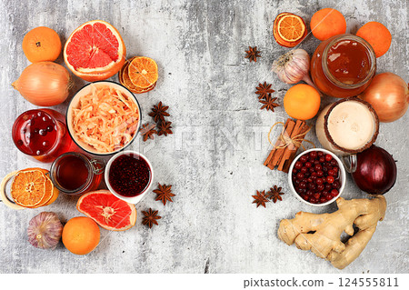 Fresh fruits, vegetables, spices and natural ingredients to strengthen the immune system. Healthy natural products with vitamin C to treat flu and colds. Organic virus protection, selective focus. 124555811