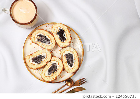 Concept of modern bakery, festive treat. Homemade delicious tiramisu, sponge cake or cake with sweet jam, cream, nuts, cinnamon and milk drink eggnog with cocoa. And advertising for cafe and Concept of modern bakery, festive treat. Homemade delicious tiramisu, sponge cake or cake with sweet jam, cream, nuts, cinnamon and milk drink eggnog with cocoa. And advertising for cafe and 124556735