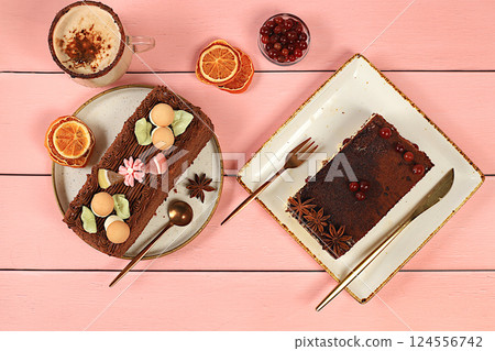 Concept of modern bakery, festive treat. Homemade delicious tiramisu, sponge cake or cake with sweet jam, cream, nuts, cinnamon and milk drink eggnog with cocoa. And advertising for cafe and Concept of modern bakery, festive treat. Homemade delicious tiramisu, sponge cake or cake with sweet jam, cream, nuts, cinnamon and milk drink eggnog with cocoa. And advertising for cafe and 124556742