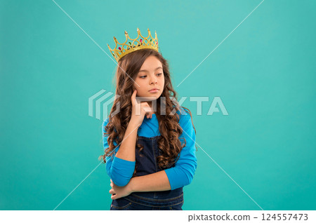 Thoughtful baby. Lady little princess. Girl wear crown. Princess manners. Winner of beauty competition. International beauty contest. Kid wear golden crown symbol of princess. Become princess 124557473