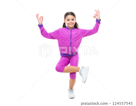 smiling teen yoga girl meditate on background. photo of teen yoga girl meditate in sportswear. 124557545