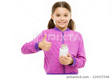 Vitamin concept. Need vitamin supplements. Healthy lifestyle. Health care. Investment into health. Take vitamin supplements. Child take medicines. Treatment and medicine. Girl hold medicines bottle 124557546