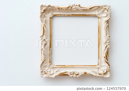 Golden frame in Baroque style with detailed carvings isolated on white background. Ornate golden frame with intricate details for art display. Mockup, empty space for text or image 124557970