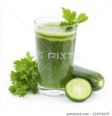 Fresh green juice with vegetables including zucchini and cucumber on white background. Green smoothie in a glass surrounded by fresh zucchini and greenery. Diet, weight loss, healthy eating 124558070