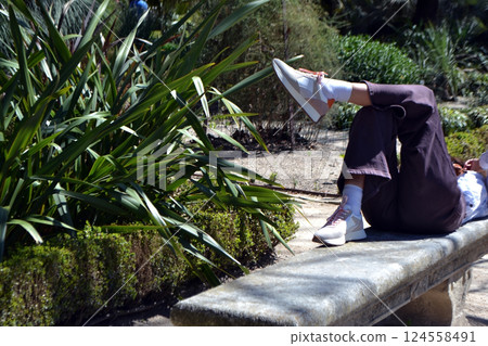 Relaxing in Madrid botanical garden Relaxing in Madrid botanical garden 124558491