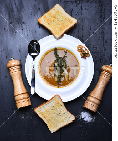 French cuisine concept. Cream soup or puree on grey background 124559345