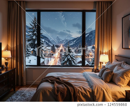 Cozy winter retreat: serene bedroom with scenic snowy mountain village view at night 124559868