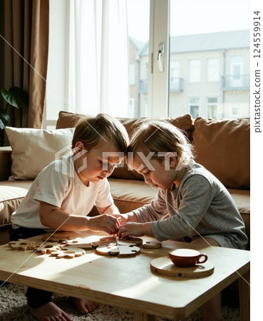 Creative playtime: kids engaged with wooden clock puzzle in cozy living room setting 124559914