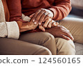 Mature couple, bonding and holding hands in support, trust or security in house, home or marriage counseling sofa. Zoom, black woman or man in counselling therapy for mental health, anxiety or stress 124560165