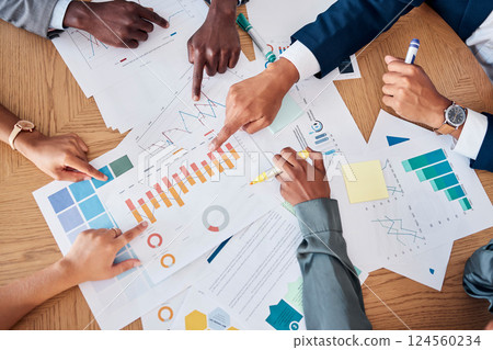 Meeting, paperwork and business people planning a project together in a corporate modern office. Documents, diversity and hands of a team working on a strategy with statistics, graphs and charts data 124560234