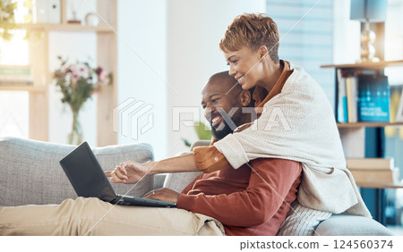 Pointing, laptop or bonding mature couple on sofa in house or home living room on real estate, property or apartment internet search. Smile, happy or hug black woman and man with mortgage technology 124560374
