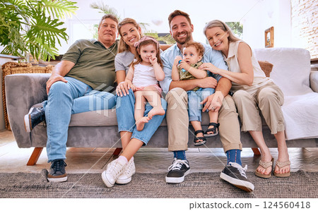 Happy big family, relax and smile on living room sofa for quality bonding time together at home. Portrait of family smiling and relaxing on couch for lounge break, weekend or holiday at the house 124560418