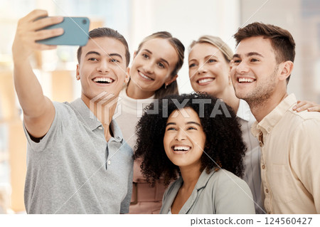 Diversity work, happy group selfie with phone in office for solidarity or team building in marketing startup. Multicultural team smile, smartphone photo together or workplace happiness community 124560427