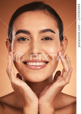 Portrait, skincare and woman face for natural beauty, organic facial and smile in brown studio background. Young girl, happy and cosmetics for makeup, wellness and healthy with smooth and glow skin. 124560468