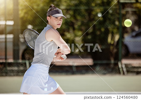 Fitness, sports and tennis with woman on court training for game, strike and playing competition match. Workout, exercise and health with girl tennis player for summer, action and athlete in outdoor 124560480