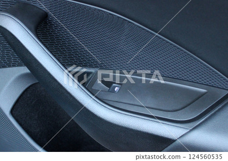Design of door handle, inner pocket and window up button on the front door of a car Design of door handle, inner pocket and window up button on the front door of a car 124560535